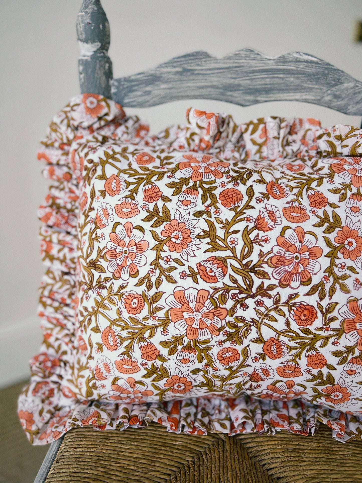 CORAL BRONZE FLORAL BLOCK PRINT RUFFLE CUSHION
