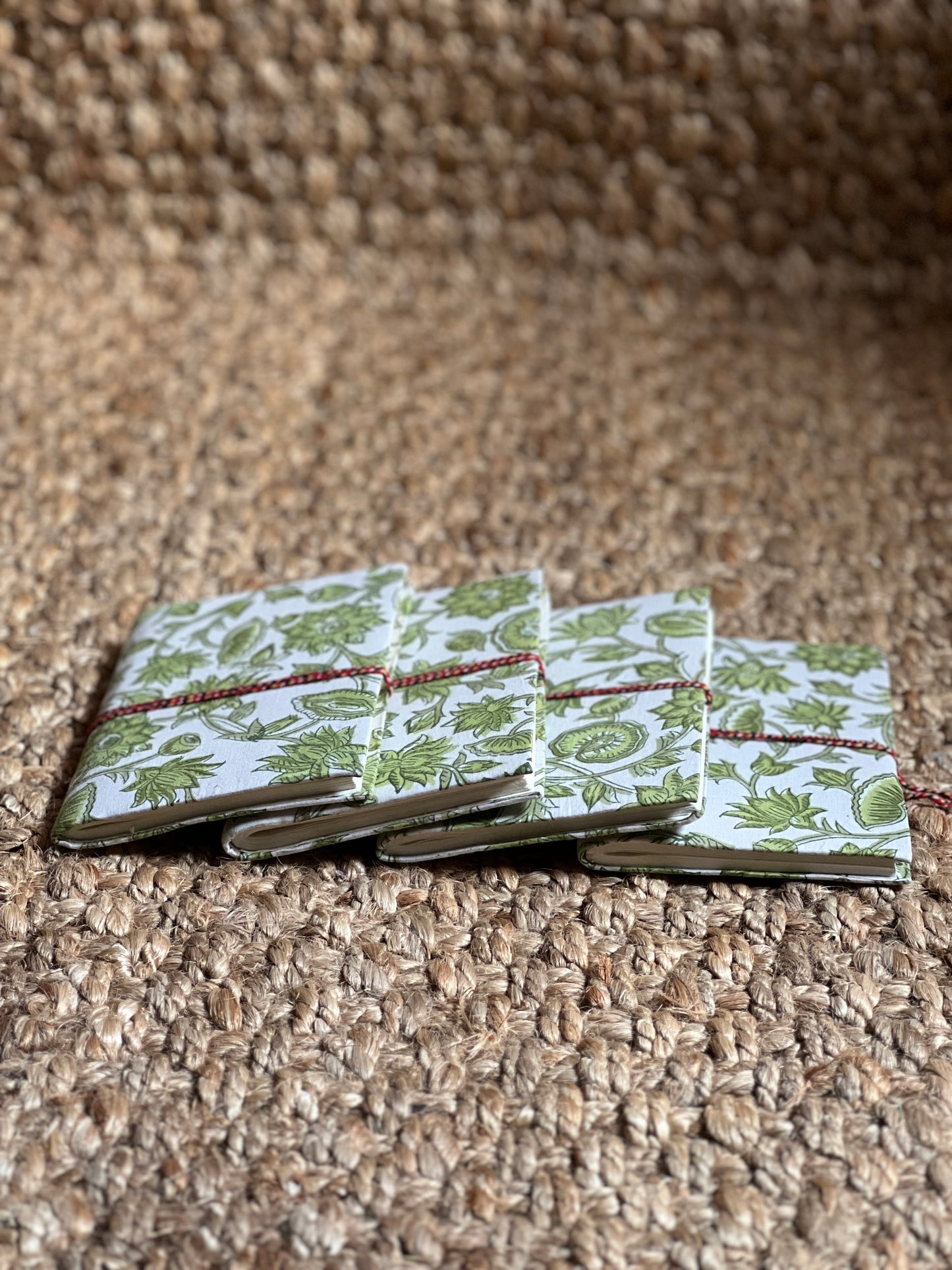 GREEN LINED NOTEBOOK